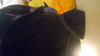 him in a latec catsuit