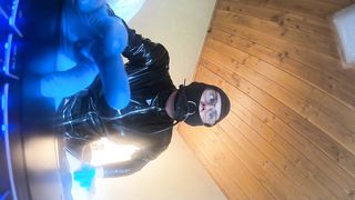 him in a latec catsuit