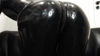 Femboy showcasing and grinding his black shining spandex catsuit