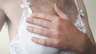 Crossdresser stroking dressed in a Bridal Basque