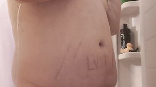 Calm T-Woman Showcases off her bra-stuffers and booty in the bathroom