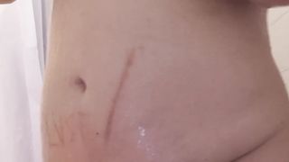 Calm T-Woman Showcases off her bra-stuffers and booty in the bathroom