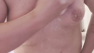 Calm T-Woman Showcases off her bra-stuffers and booty in the bathroom