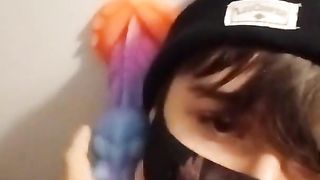 Cuffed femboy deepthroat a fake penis with a v-card box