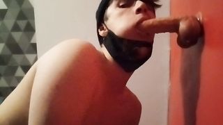 Cuffed femboy deepthroat a fake penis with a v-card box