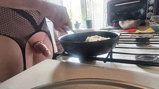 Bare kitchen. Pasta carbonara.