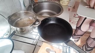 Bare kitchen. Pasta carbonara.