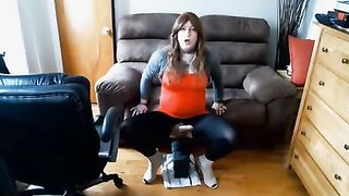 Gurl sits on machine manmeat