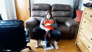 Gurl sits on machine manmeat