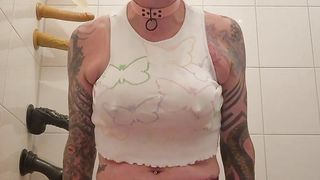 Sissy in butterfly top railing a faux-cock