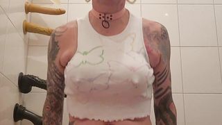 Sissy in butterfly top railing a faux-cock