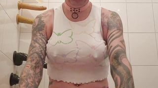 Sissy in butterfly top railing a faux-cock