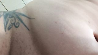 Fatty ladyboy plays with large white faux-cock in shower