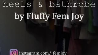 Ladyboy in high-heeled slippers and robe