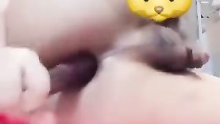 Horny bitch taking egg plant