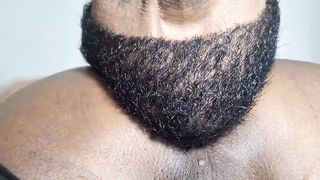 Putting his bone in the transvestite's hair.