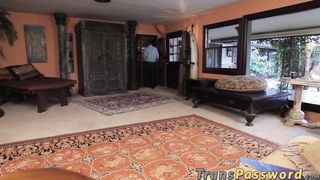 Skinny black guy dicks a stunning shemale hooker from behind