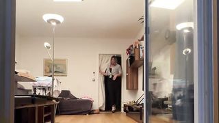 Sissy in Leggins toying with Faux-cock on balcony