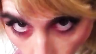 Sissy fellates and takes her fountain on her face