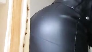 German Teenage crossdresser enjoys leather clothes