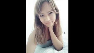 Teenage She-Creature being pretty with her cellphone