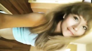 Teenage She-Creature being pretty with her cellphone