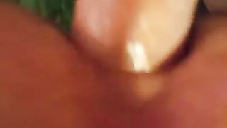 Heather leans over and takes enormous pearly pipe