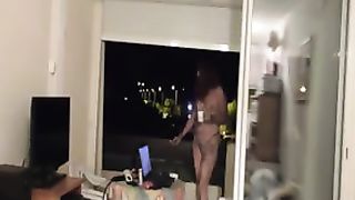 SONIA  ALONE ON BALCONY