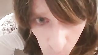 sissy deep-throating a faux-cock