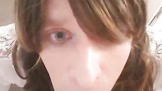 sissy deep-throating a faux-cock