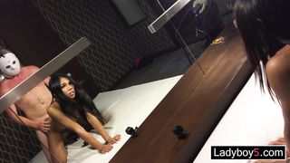 Two Asian femboys handcuffed cock share