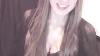 A movie of a crossdresser dressed in sunglasses jacking