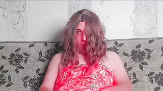 Sweet sissy posing next to sensitized glowing candles