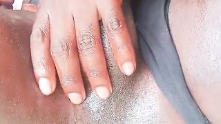 Beautiful ebony transgender princess draining her meaty trunk outdoors