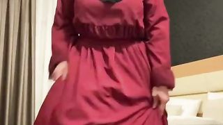 Fatima dancing in hotel room