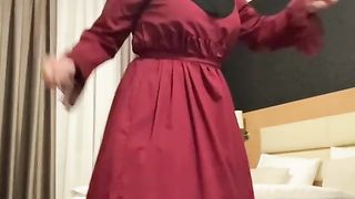 Fatima dancing in hotel room