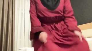 Fatima dancing in hotel room