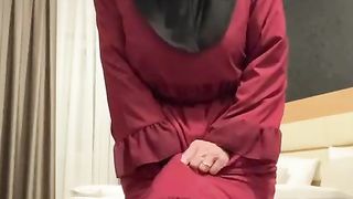 Fatima dancing in hotel room