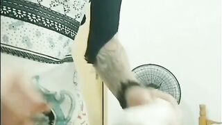 Sissy Mavka cleaning and toying with a fake penis.