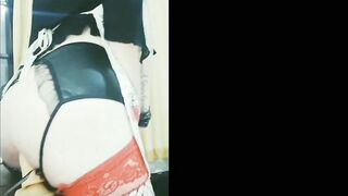 Sissy Mavka cleaning and toying with a fake penis.