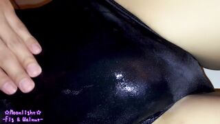 Dark blue bathing suit with greasy lotion!