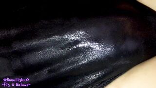 Dark blue bathing suit with greasy lotion!