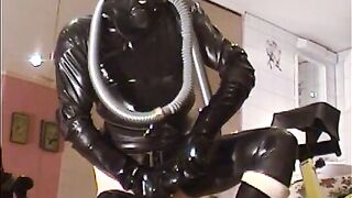 Roxina2003GasmaskAndTube110203XL.WMV