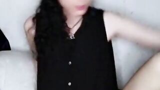 Gothic gal jacks and plays with her butt.