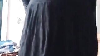 Indian Homo Crossdresser Gaurisissy demonstrating and pressing her large bra-stuffers in black sundress