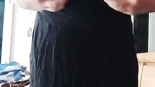 Indian Homo Crossdresser Gaurisissy demonstrating and pressing her large bra-stuffers in black sundress