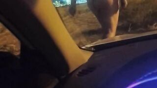 Naked outside the car