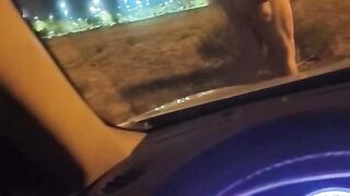 Naked outside the car