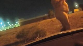 Naked outside the car
