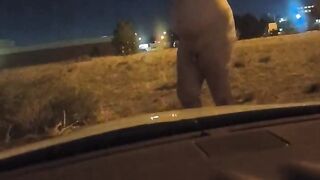 Naked outside the car